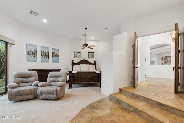 36600 N 50th St, Cave Creek, AZ 85331 - living area featuring arched walkways, ceiling fan, recessed lighting, and light carpet