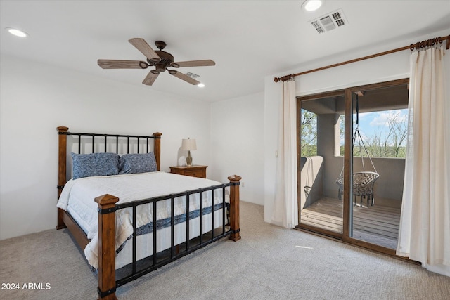 bedroom with access to outside, ceiling fan, and carpet