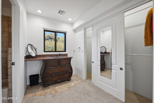 bathroom featuring tile patterned flooring