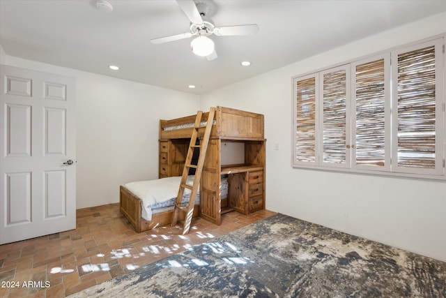 unfurnished bedroom with ceiling fan