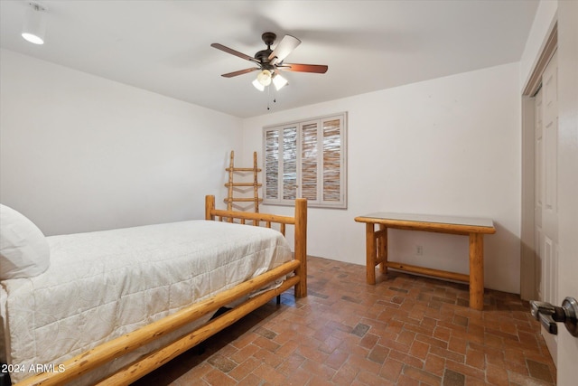 bedroom with a closet and ceiling fan