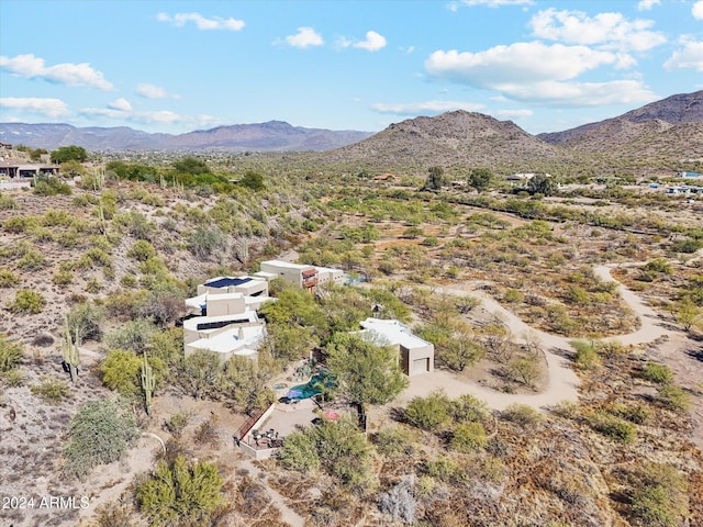 drone / aerial view featuring a mountain view