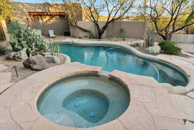 36600 N 50th St, Cave Creek, AZ 85331 - view of swimming pool with a fenced backyard and a pool with connected hot tub