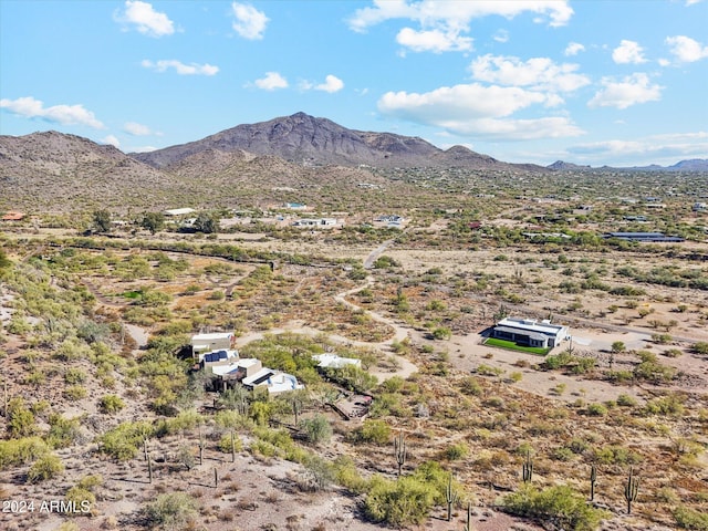 birds eye view of property featuring a mountain view