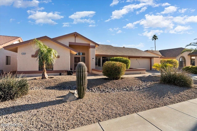 single story home with a garage