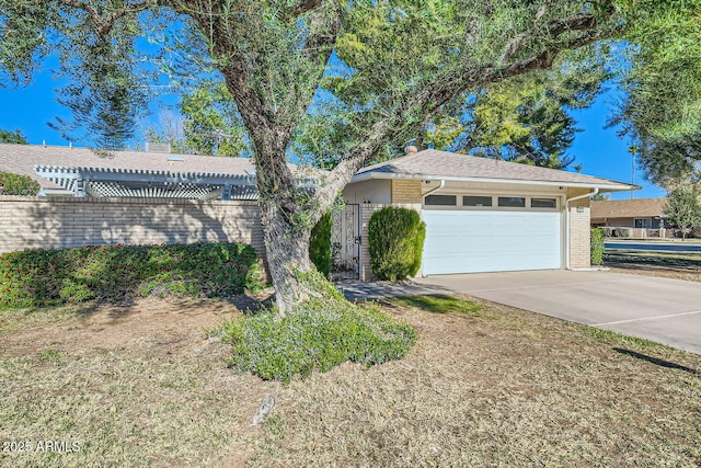 ranch-style house featuring a garage