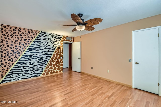 interior space featuring ceiling fan and light hardwood / wood-style floors