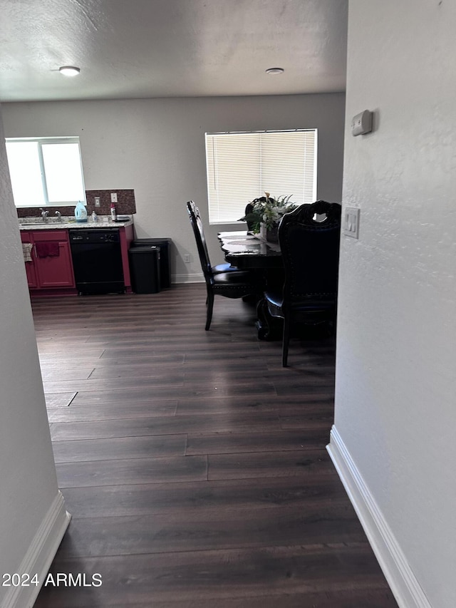 dining area featuring dark hardwood / wood-style flooring