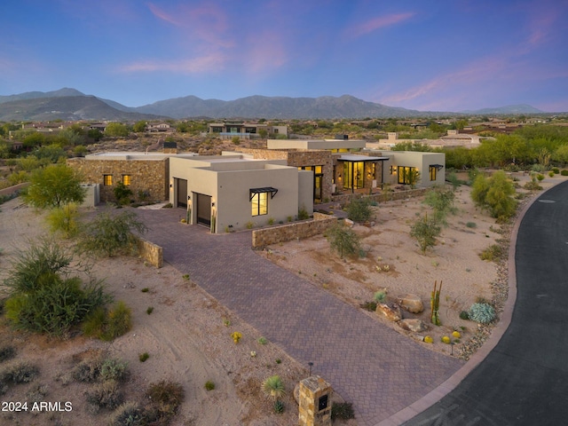 view of front of home with a mountain view