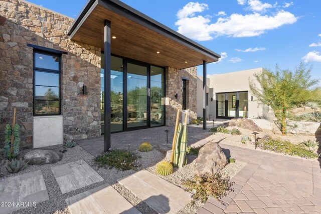 9940 E Aleka Way, Scottsdale, AZ 85262 - entrance to property with stone siding and stucco siding