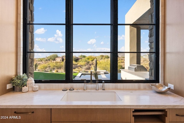 9940 E Aleka Way, Scottsdale, AZ 85262 - kitchen view of a sink and light countertops