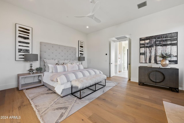 bedroom featuring ceiling fan and wood-type flooring