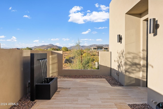 view of patio featuring a mountain view