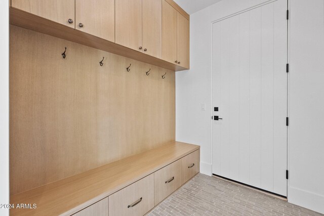 9940 E Aleka Way, Scottsdale, AZ 85262 - mudroom featuring brick patterned flooring