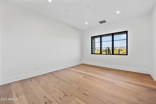 empty room featuring light hardwood / wood-style floors