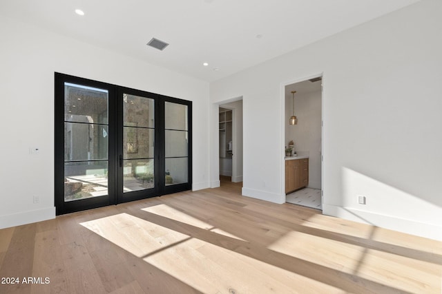 empty room with light wood-type flooring