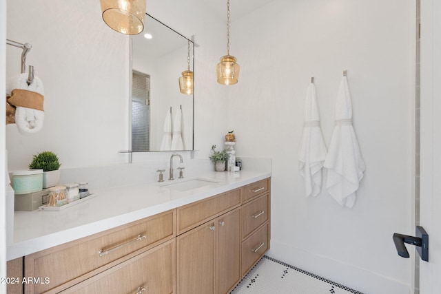 bathroom featuring tile patterned floors and vanity