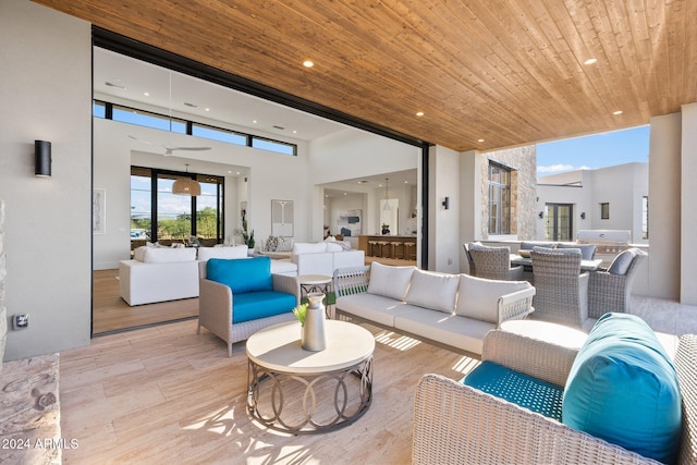 9940 E Aleka Way, Scottsdale, AZ 85262 - living room with wood finished floors, wooden ceiling, recessed lighting, and a high ceiling