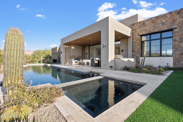 view of swimming pool with a patio area, an outdoor living space, and an in ground hot tub