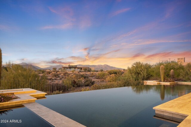 9940 E Aleka Way, Scottsdale, AZ 85262 - dock area featuring a mountain view