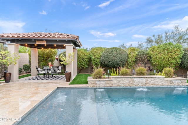 view of pool with a patio area, a fenced backyard, and a fenced in pool