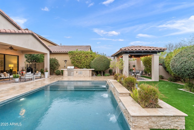 view of swimming pool featuring ceiling fan, a patio, a fenced backyard, area for grilling, and a gazebo