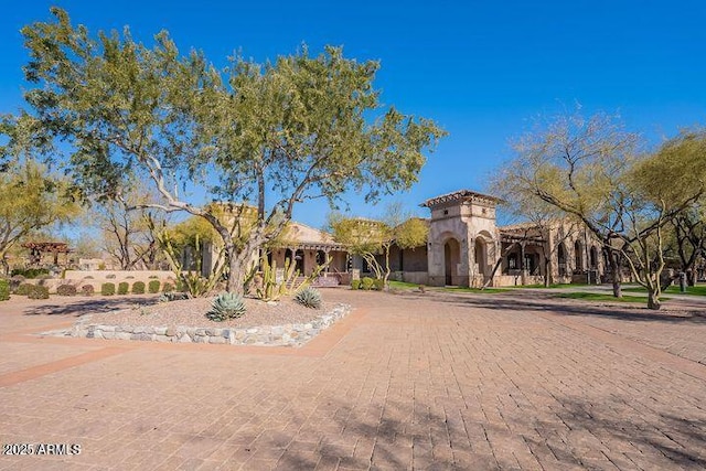 view of front of house featuring fence