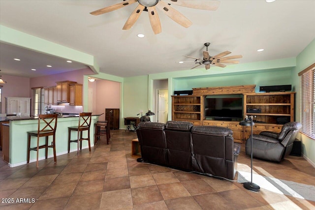 living room with ceiling fan