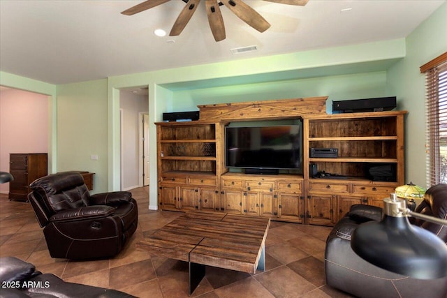 living room with ceiling fan