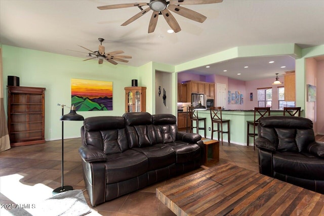 living room featuring dark tile patterned floors