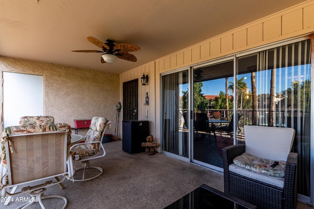 view of patio / terrace featuring ceiling fan