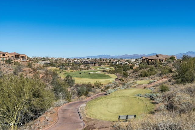 birds eye view of property featuring a mountain view