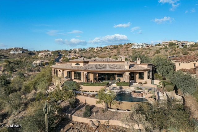 back of house featuring a patio area