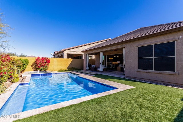 view of pool featuring a patio and a lawn