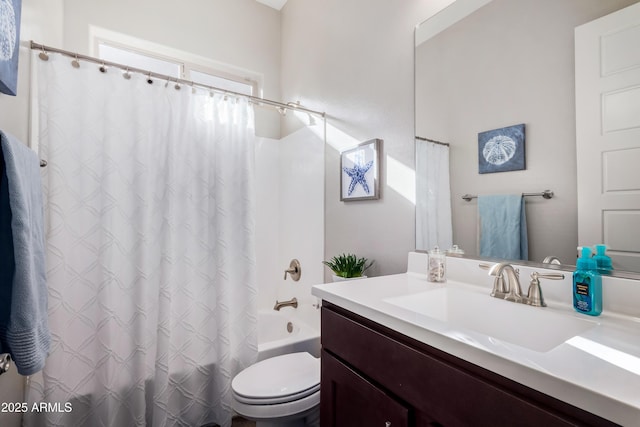 full bathroom featuring toilet, shower / tub combo, and vanity