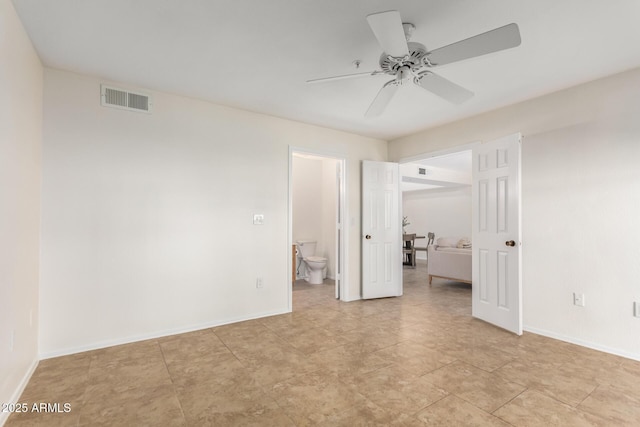 9460 E Mission Ln Unit 115, Scottsdale, AZ 85258 - unfurnished room featuring a ceiling fan and baseboards