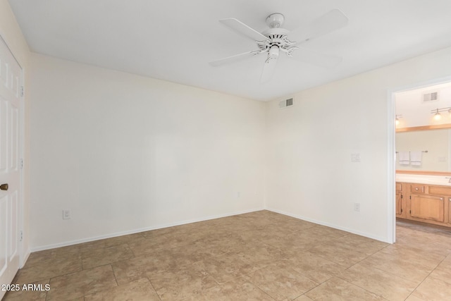 9460 E Mission Ln Unit 115, Scottsdale, AZ 85258 - unfurnished bedroom with connected bathroom and ceiling fan