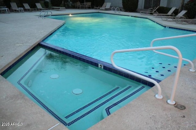 9460 E Mission Ln Unit 115, Scottsdale, AZ 85258 - view of pool with a patio and a pool with connected hot tub