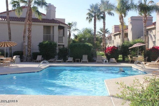 9460 E Mission Ln Unit 115, Scottsdale, AZ 85258 - community pool featuring a patio area
