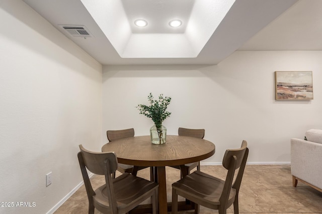 9460 E Mission Ln Unit 115, Scottsdale, AZ 85258 - dining area featuring a raised ceiling and recessed lighting