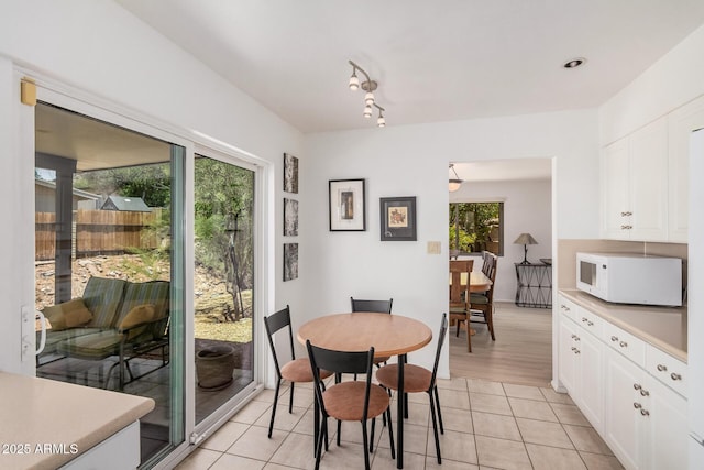 6802 N 26th St, Phoenix, AZ 85016 - dining room with light tile patterned flooring