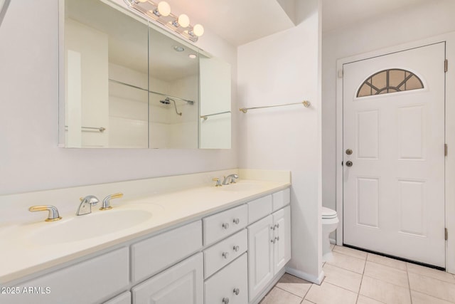 6802 N 26th St, Phoenix, AZ 85016 - full bathroom with double vanity, tile patterned flooring, and a shower