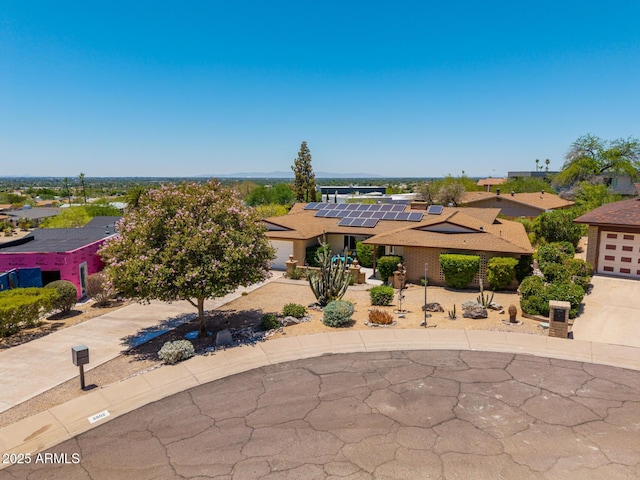 6802 N 26th St, Phoenix, AZ 85016 - view of front of property with solar panels and roof with shingles