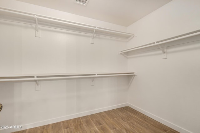 16120 N 86th Ln, Peoria, AZ 85382 - walk in closet with wood finished floors