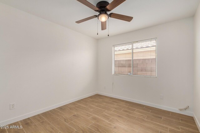 16120 N 86th Ln, Peoria, AZ 85382 - empty room with light wood finished floors, baseboards, and ceiling fan