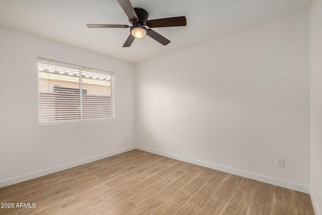 16120 N 86th Ln, Peoria, AZ 85382 - empty room with light wood finished floors, baseboards, and a ceiling fan