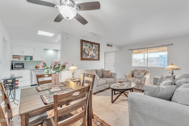 living room featuring ceiling fan