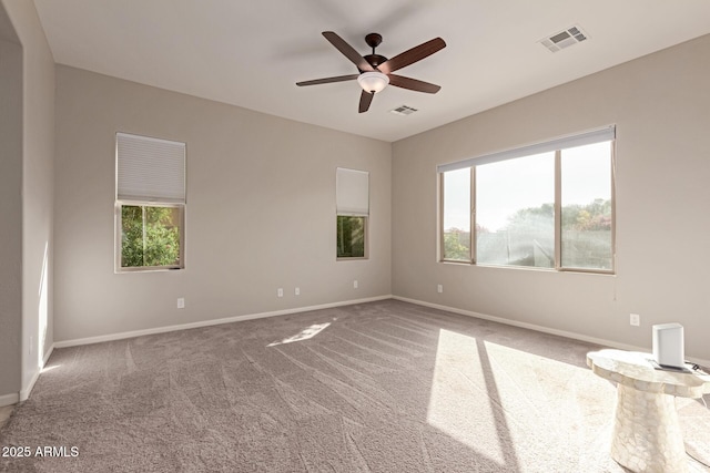 unfurnished room featuring carpet flooring and ceiling fan