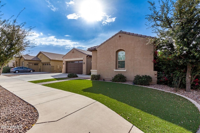 view of front of home with a garage