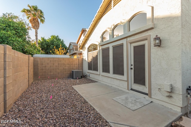 exterior space featuring a patio area and central air condition unit